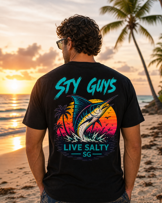 Man wearing the Live Salty tee, Neon colorway, with a leaping marlin back print