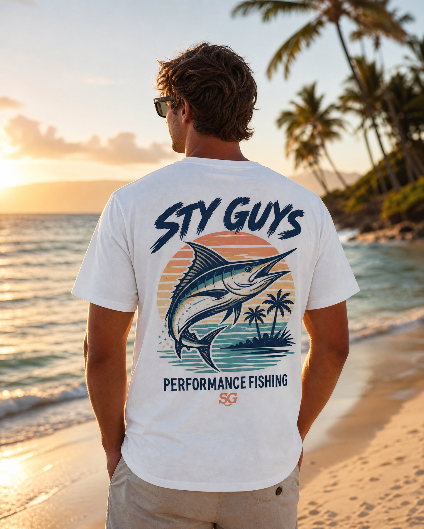 Man wearing the Tight Lines tee, Beach colorway, with a sailfish back print